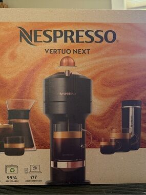 Brand new never opened Nespresso machine.